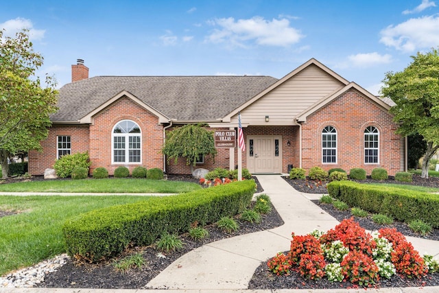 ranch-style house with a front yard