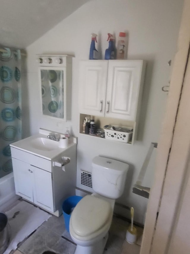 full bathroom featuring vanity, shower / bath combo with shower curtain, tile patterned flooring, toilet, and lofted ceiling