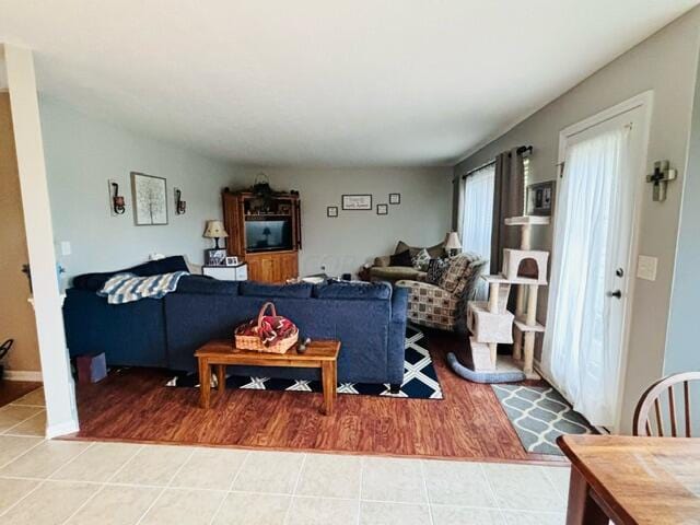 living room featuring tile patterned floors