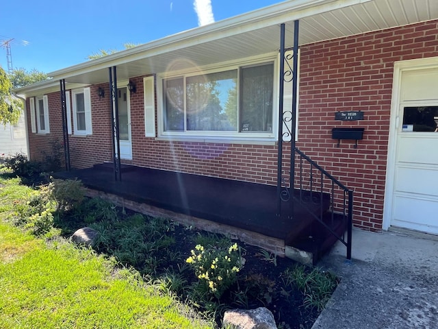 view of home's exterior featuring covered porch