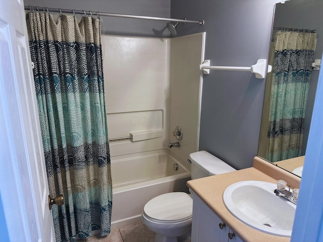 full bathroom with shower / bath combo with shower curtain, tile patterned flooring, vanity, and toilet