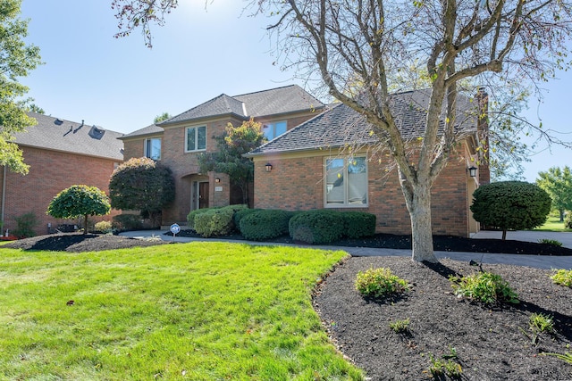 view of front property featuring a front yard