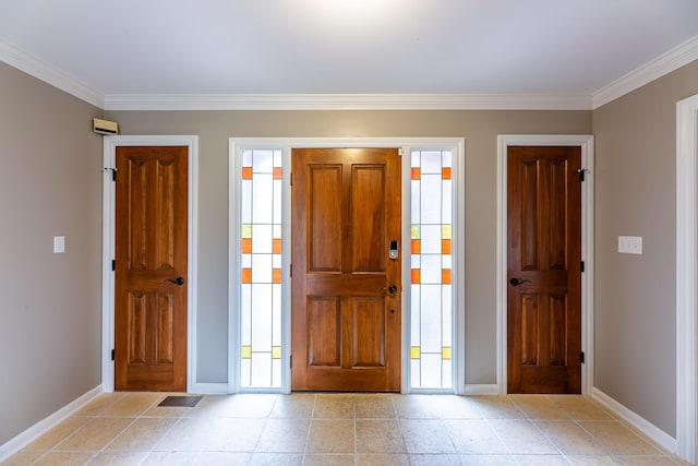 entrance foyer featuring a healthy amount of sunlight and ornamental molding