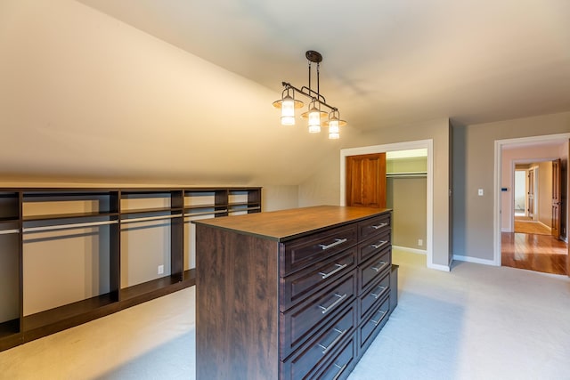 spacious closet featuring light hardwood / wood-style flooring