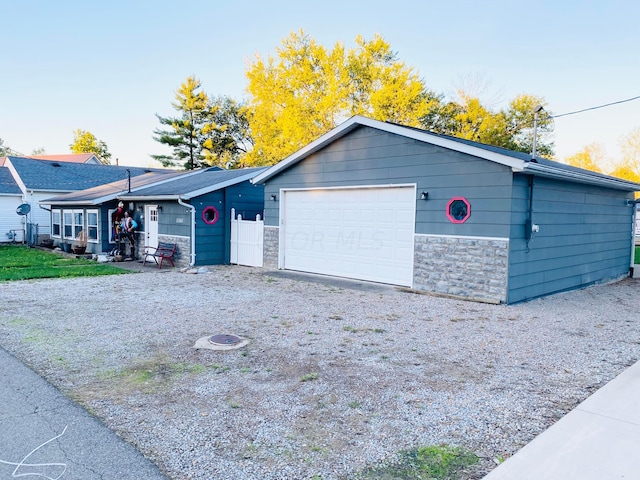 single story home featuring a garage