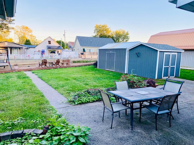 view of patio with a shed