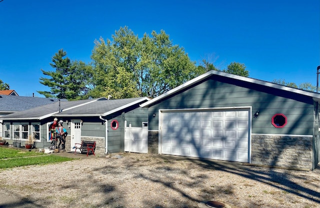 single story home featuring a garage