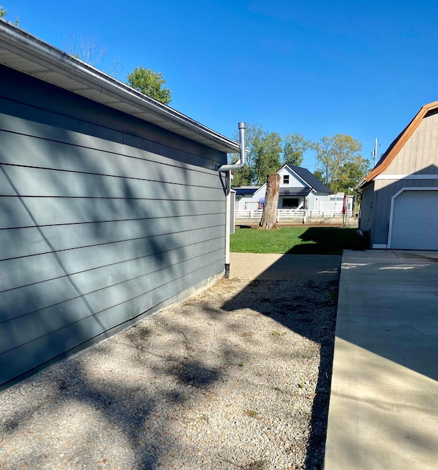 view of property exterior featuring a garage