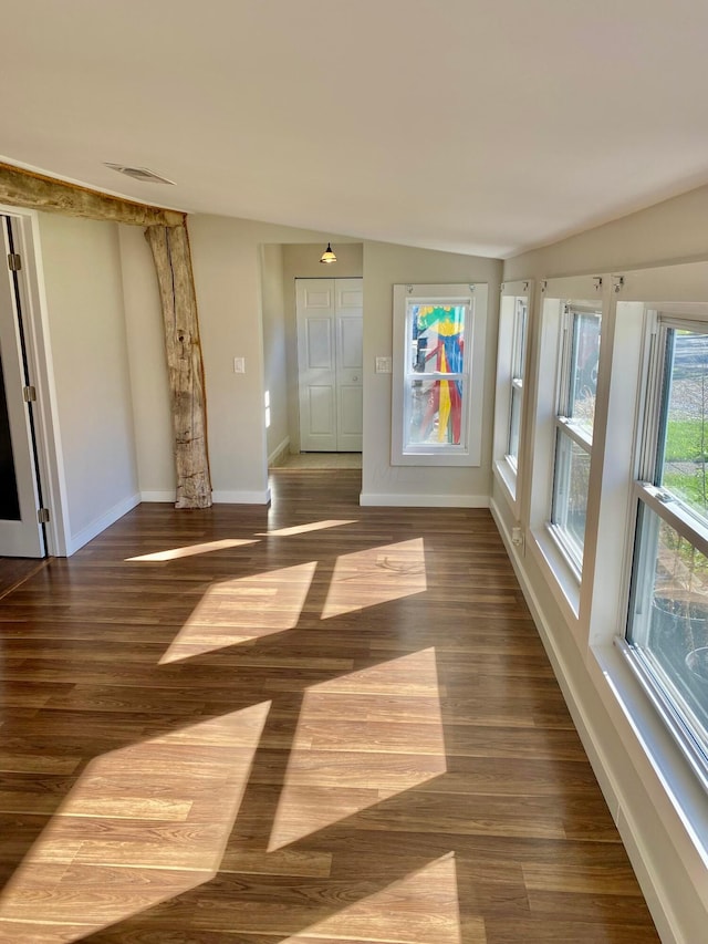 spare room featuring hardwood / wood-style floors