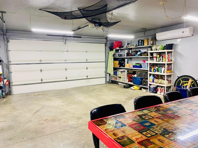 garage featuring a wall mounted AC