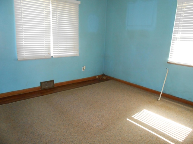 view of carpeted spare room