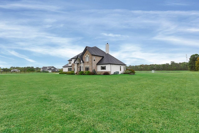 view of property exterior featuring a lawn