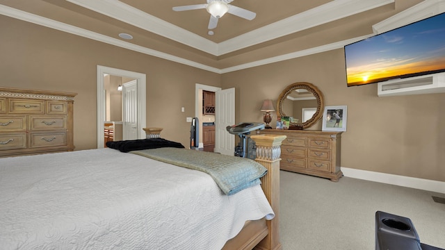 carpeted bedroom featuring ceiling fan and crown molding