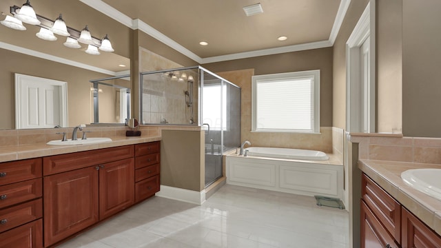 bathroom with tile patterned floors, vanity, ornamental molding, and shower with separate bathtub