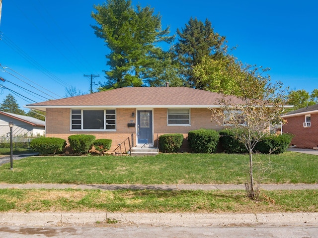 ranch-style house with a front lawn