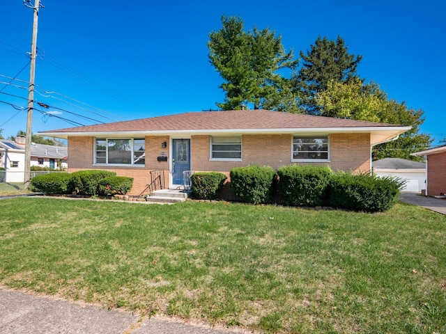 ranch-style home with a front yard