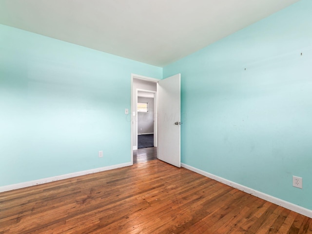 empty room featuring hardwood / wood-style floors