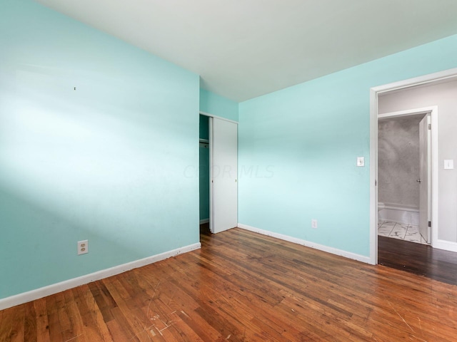 unfurnished bedroom featuring wood-type flooring