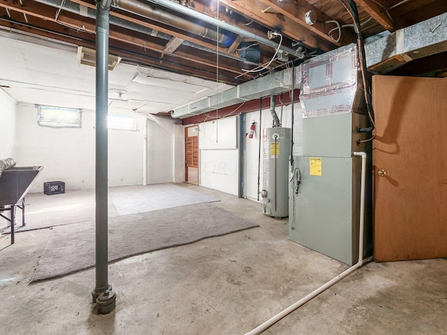 basement featuring water heater