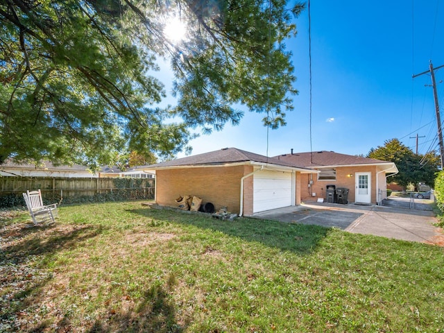 view of property exterior featuring a patio area, a garage, and a yard