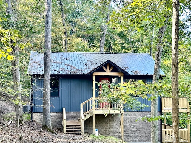 view of front of house featuring cooling unit