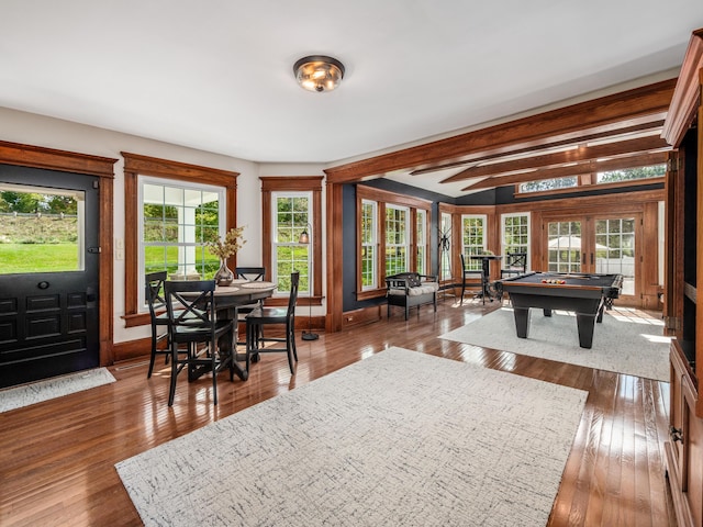 interior space featuring beamed ceiling, french doors, dark hardwood / wood-style flooring, and pool table