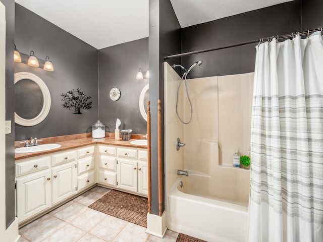 bathroom with tile patterned flooring, vanity, and shower / bath combination with curtain