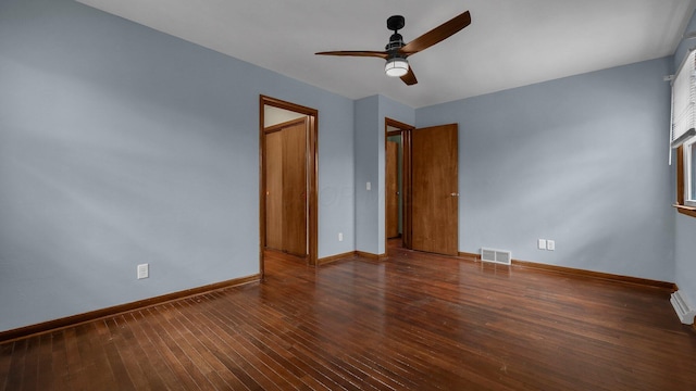 unfurnished bedroom with dark wood-type flooring and ceiling fan