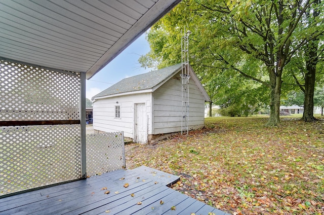 wooden deck featuring an outdoor structure