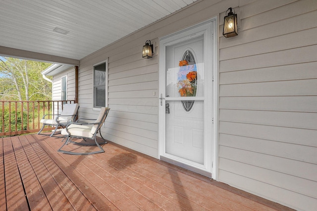 doorway to property featuring a porch