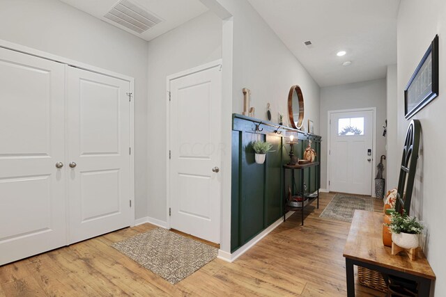 entryway with light hardwood / wood-style flooring