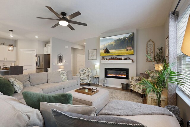 living room featuring ceiling fan