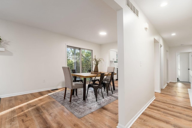 dining area featuring light hardwood / wood-style flooring