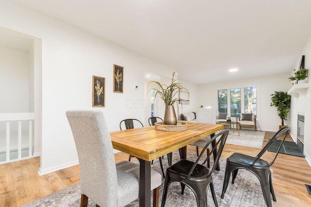 dining room featuring light wood-type flooring