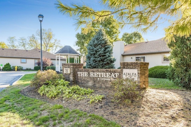 view of community sign