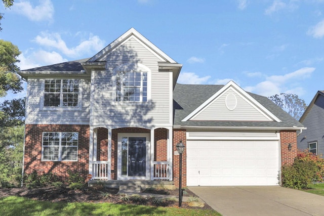 view of front of property featuring a garage