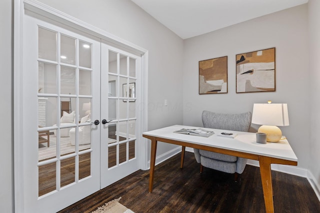 home office with dark wood-type flooring and french doors