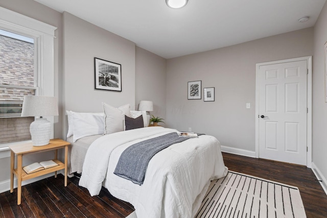 bedroom featuring dark hardwood / wood-style floors