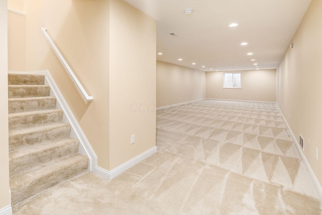 basement with light carpet