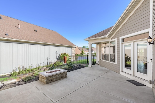 view of patio / terrace with a fire pit