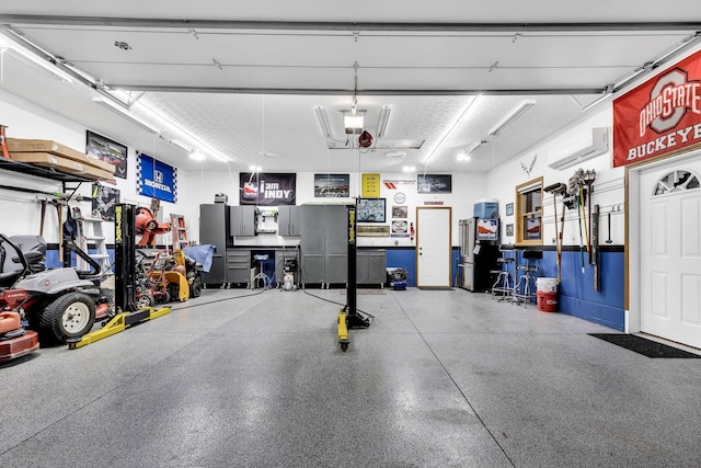 garage with a wall unit AC