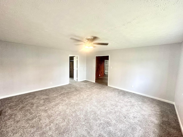 unfurnished room featuring carpet, ceiling fan, and a textured ceiling