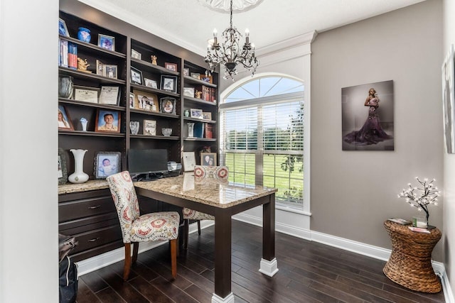 home office with a chandelier, dark hardwood / wood-style flooring, and ornamental molding