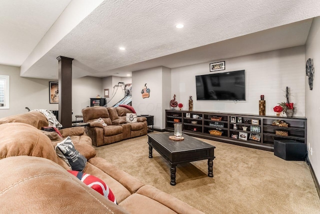 carpeted living room featuring a textured ceiling