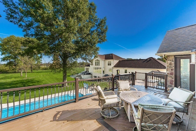 wooden deck featuring a fenced in pool