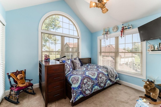 carpeted bedroom featuring vaulted ceiling