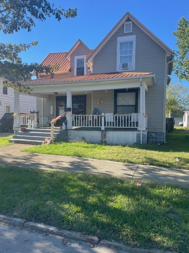618 E Temple St, Washington Court House, OH 43160 - bungalow-style home featuring a front yard, metal roof, covered porch, and a standing seam roof