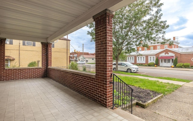 view of patio featuring a porch