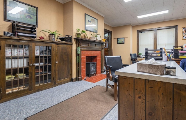 home office with carpet flooring and ornamental molding