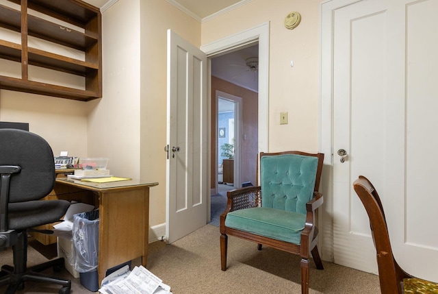 office area featuring crown molding and light carpet